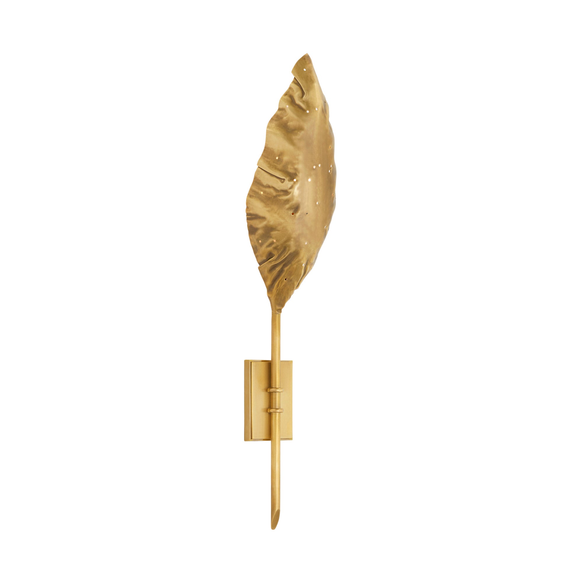Leaf-shaped sconce with intricate piercings, casting elegant light patterns.