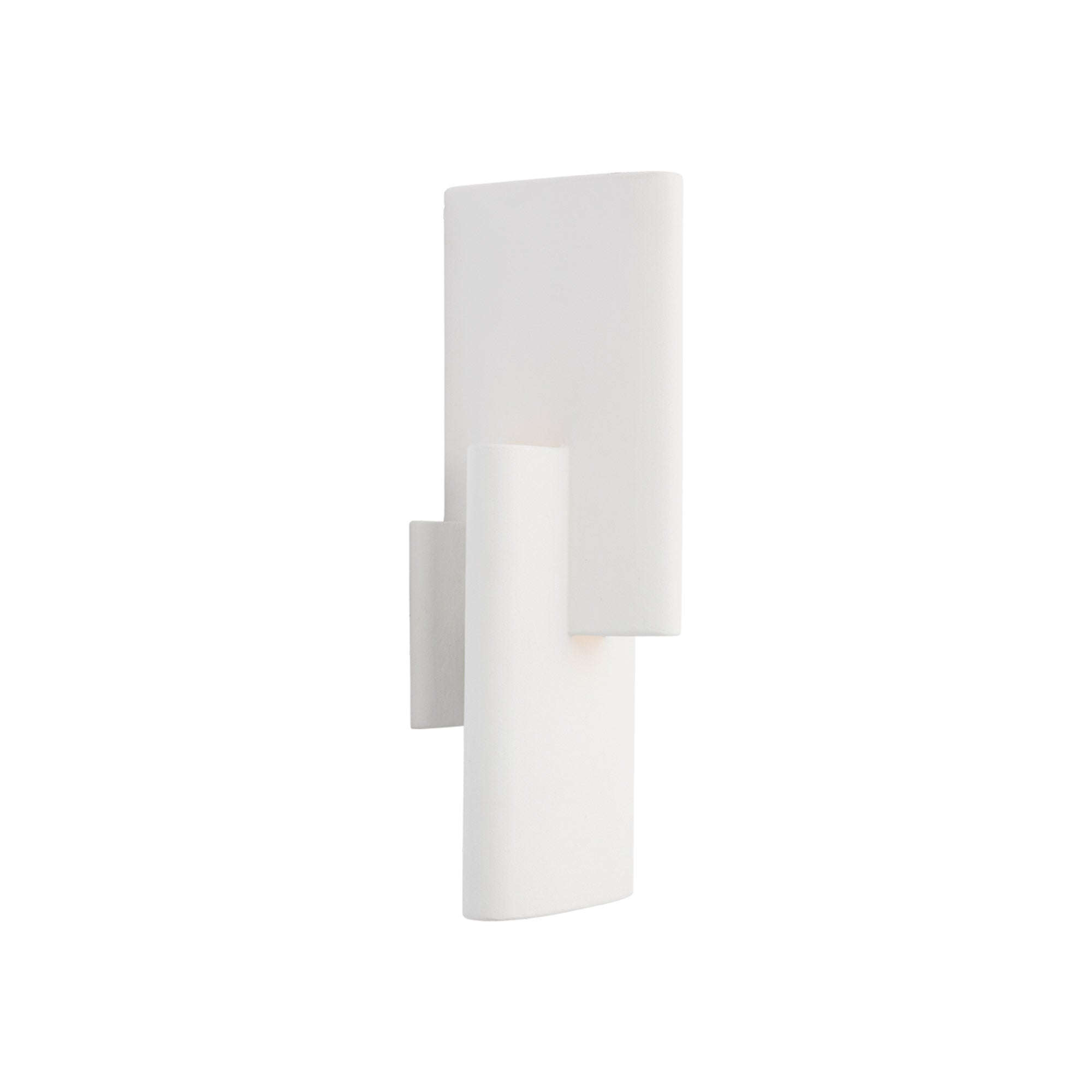 Textured metal sconce with intersecting forms, casting dynamic light and shadow.