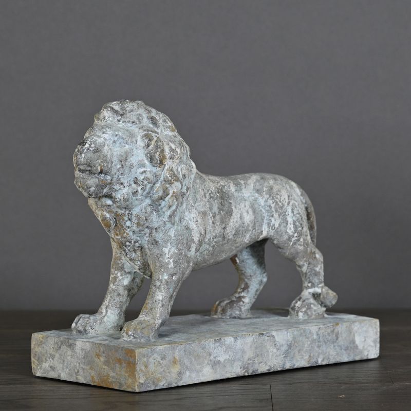 XIXth Century Roaring Lion – inspired by Empire-era mansion parks, with a distinctive blue-grey patina, perfect as an ornament or bookends.