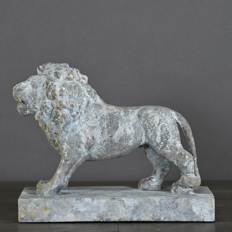 XIXth Century Roaring Lion – inspired by Empire-era mansion parks, with a distinctive blue-grey patina, perfect as an ornament or bookends.