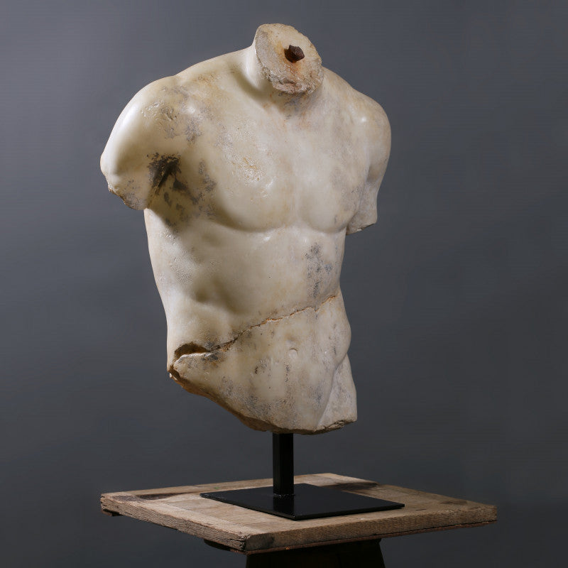 Torso Discophorus – a fragmentary reproduction of Naucydes' 4th-century BC discus thrower, inspired by the lost bronze original, with a full replica housed in the Louvre Museum.