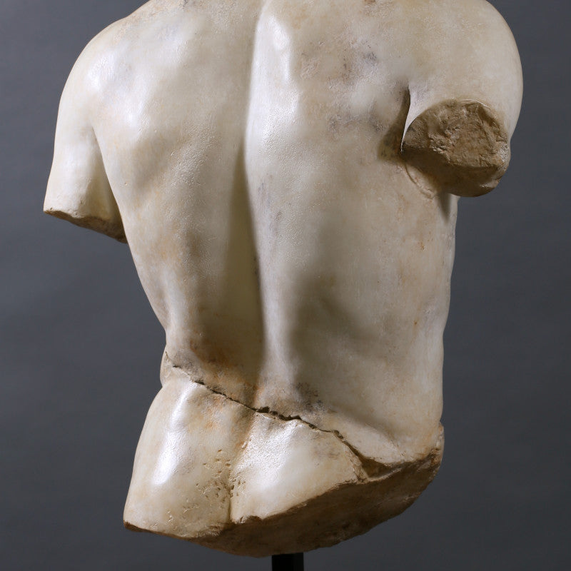 Torso Discophorus – a fragmentary reproduction of Naucydes' 4th-century BC discus thrower, inspired by the lost bronze original, with a full replica housed in the Louvre Museum.