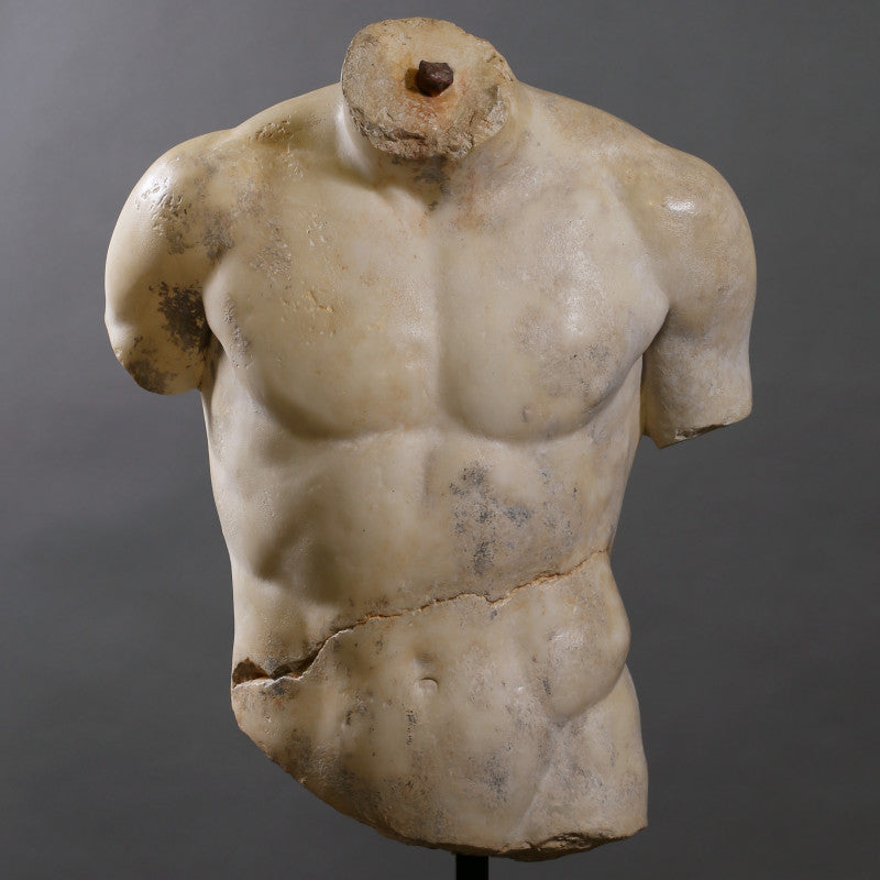 Torso Discophorus – a fragmentary reproduction of Naucydes' 4th-century BC discus thrower, inspired by the lost bronze original, with a full replica housed in the Louvre Museum.