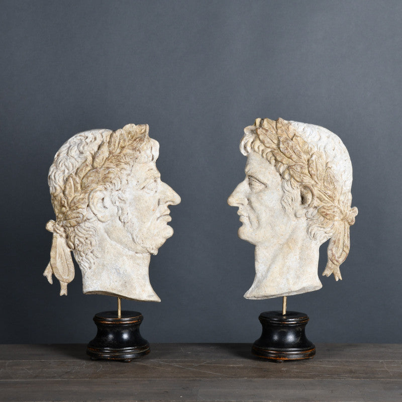 Pair of Roman Emperors – 18th-century cameo-style replica of Caesar’s profile, crafted during the 'Grand Tour' for curiosity cabinets.