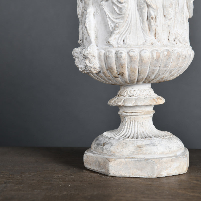 19th-Century Classical-Style Medici Vase – ceramic replica with a Greek scene, inspired by temple sculptures, featuring an aged patina finish.